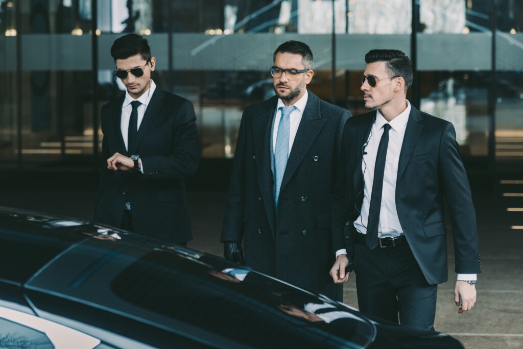 two-bodyguards-going-with-businessman-to-black